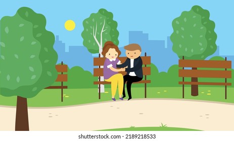 Loving couple sitting on a bench in the park