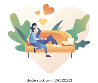 Loving couple spending time or relaxing together. Man and woman sit on the sofa in the home atmosphere.  Romantic date concept. Characters Valentine day. Modern flat cartoon style. Vector illustration