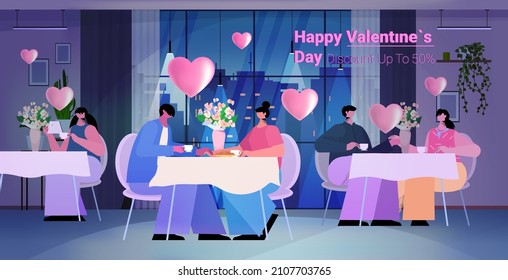 loving people celebrating happy valentines day men women in love drinking coffee in cafe horizontal
