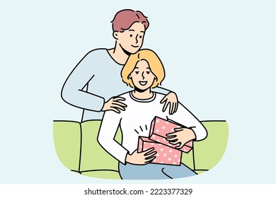 Loving young man make birthday present to excited woman at home. Caring male surprise congratulate happy female with anniversary. Vector illustration. 