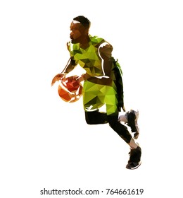 Low poly basketball player running with ball, abstract vector illustration