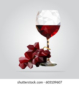 Low poly glass of red wine icon. Triangle red wine with grape