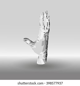 Low poly hand in gray tones on a gradient background.