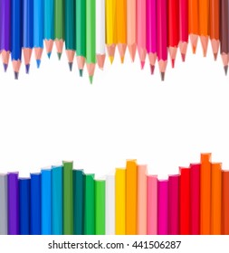 Low poly illustration frame of multicolored pensils