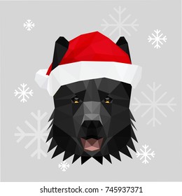 Low poly vector illustration of the shepherd dog's head wearing Santa's hat. 