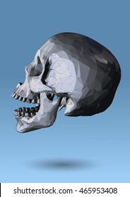 Low poly wireframe skull side view on blue background