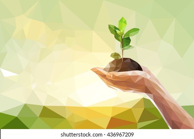 Low polygon of two Hand holding young plant on green nature blur bokeh background