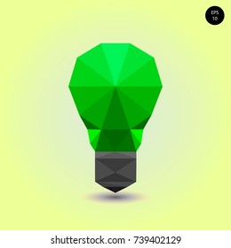 low polygonal light bulb concept symbol green