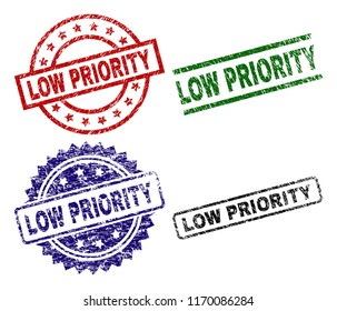 LOW PRIORITY seal prints with distress texture. Black, green,red,blue vector rubber prints of LOW PRIORITY label with scratched texture. Rubber seals with round, rectangle, rosette shapes.