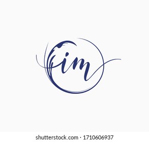 Lowercase IM Initial handwriting logo. Template vector letter linked in circle.