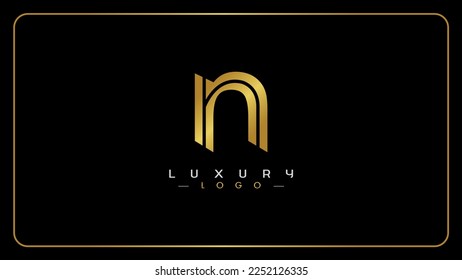 Letra minúscula N diseño de logotipo de monograma dorado.