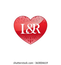 L&R initial letter couple logo with ornament heart shape
