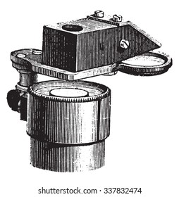 Lucida Mr. Nachet adopted under the microscope, vintage engraved illustration. Industrial encyclopedia E.-O. Lami - 1875.
