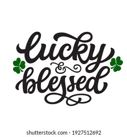 Lucky and blessed. Hand lettering St. Patrick's day quote with shamrocks isolated on white background. Vector typography for home decor, t shirts, mugs, posters, banners, greeting cards