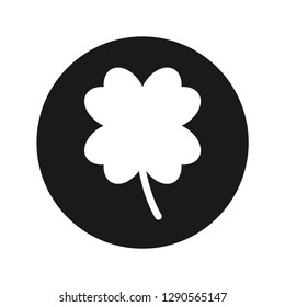 Lucky four leaf clover icon vector illustration design isolated on flat black round button