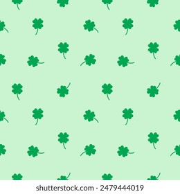 Lucky Four leaf green clovers seamless pattern, background texture