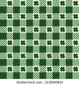 Lucky green four leaf pattern vector on tartan green and white background.Cute seamless for used fabric,wrapping,textile,tablecloth,cover,book,wallpaper and so on.Design on St. Patrick's Day concept. 