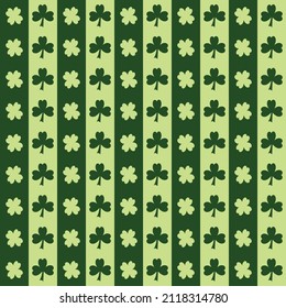 Lucky green leaf pattern vector on stripes line green set background.Cute seamless for used fabric,wrapping,textile,tablecloth,cover,book,wallpaper and so on.Design on St. Patrick's Day concept. 