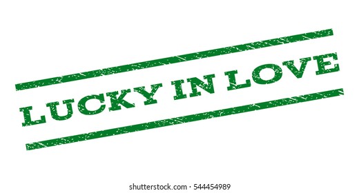 Lucky In Love watermark stamp. Text caption between parallel lines with grunge design style. Rubber seal stamp with scratched texture. Vector green color ink imprint on a white background.