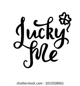 Lucky me lettering with shamrock. St. Patrick's hand drawn quote. Brush paint strokes phrase isolated on white background.