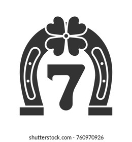 Lucky seven game glyph icon. Silhouette symbol. Horseshoe and four leaf clover with number 7. Negative space. Vector isolated illustration