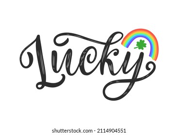 Lucky word Celtic brush calligraphy decorated by rainbow and four-leaf clover shamrock. St Patrick's day lettering as design for t-shirt, card, postcard