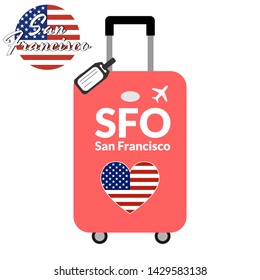 Luggage with airport station code IATA or location identifier and destination city name San Francisco, SFO. Travel to the United States of America concept. Heart shaped flag of the USA on baggage