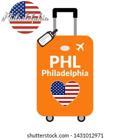 Luggage with airport station code IATA or location identifier and destination city name Philadelphia, PHL. Travel to the United States of America concept. Heart shaped flag of the USA on baggage