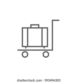Luggage on trolley line icon.