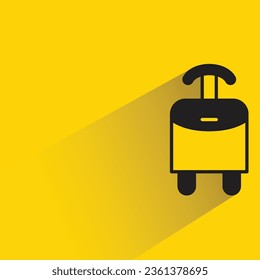 luggage with shadow on yellow background