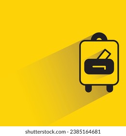 luggage with shadow on yellow background