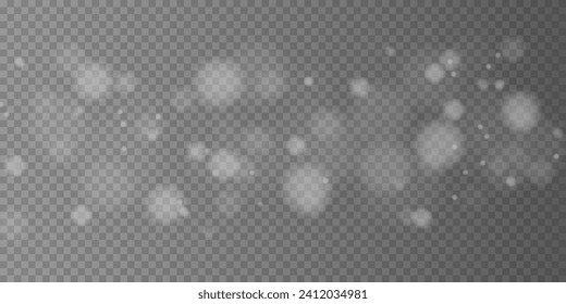 Luminous bokeh softly shimmering white light. Light abstract glowing lights.  Christmas background glowing dust glowing background. 