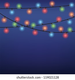 luminous garland on dark blue background