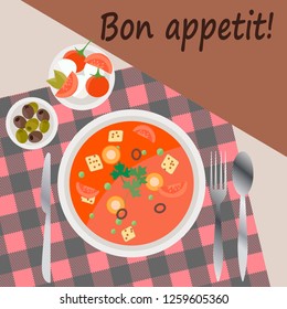 lunch on table with tablecloth, vegetables, soups appliances
