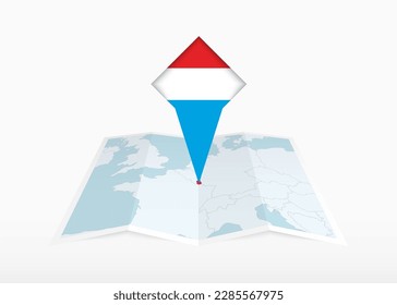 Luxembourg is depicted on a folded paper map and pinned location marker with flag of Luxembourg. Folded vector map.