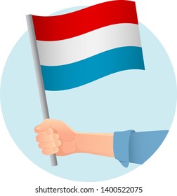 luxembourg flag in hand. Patriotic background. National flag of luxembourg vector illustration