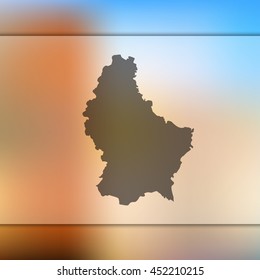Luxembourg map. Blurred background with silhouette of Luxembourg map. Vector silhouette of Luxembourg map