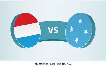 Luxembourg versus Micronesia, team sports competition concept. Round flag of countries.