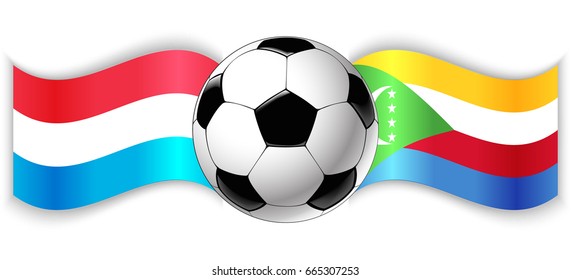 Luxembourgish and Comoran wavy flags with football ball. Luxembourg combined with Comoros isolated on white. Football match or international sport competition concept.