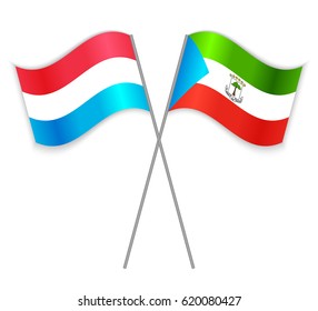 Luxembourgish and Equatorial Guinean crossed flags. Luxembourg combined with Equatorial Guinea isolated on white. Language learning, international business or travel concept.