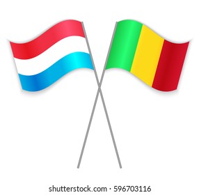 Luxembourgish and Malian crossed flags. Luxembourg combined with Mali isolated on white. Language learning, international business or travel concept.