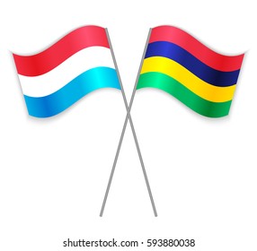 Luxembourgish and Mauritian crossed flags. Luxembourg combined with Mauritius isolated on white. Language learning, international business or travel concept.