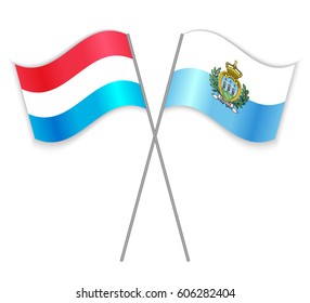 Luxembourgish and Sammarinese crossed flags. Luxembourg combined with San Marino isolated on white. Language learning, international business or travel concept.