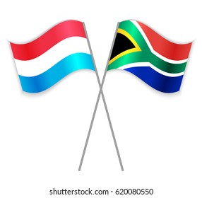 Luxembourgish and South African crossed flags. Luxembourg combined with South Africa isolated on white. Language learning, international business or travel concept.