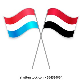 Luxembourgish and Yemeni crossed flags. Luxembourg combined with Yemen isolated on white. Language learning, international business or travel concept.