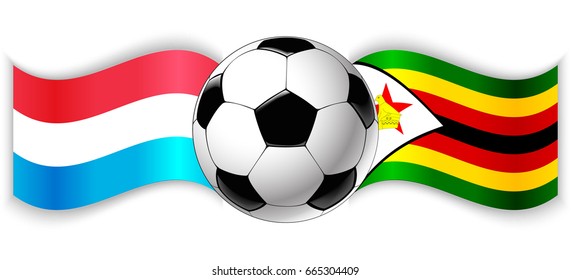 Luxembourgish and Zimbabwean wavy flags with football ball. Luxembourg combined with Zimbabwe isolated on white. Football match or international sport competition concept.