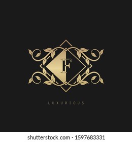 Luxurious Classic Vintage Letter F logo. Vector logo design concept classic vintage geometrical polygon with nature leaves frame soft gold color.