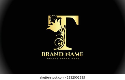 luxurious looking letter T logo in gold color