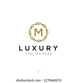 Luxurious minimalist elegant sophisticated Initial M letters geometric rounded hexagonal badge logo design vector with line art style in gold colors for hotel, boutique, jewelry, restaurant or company