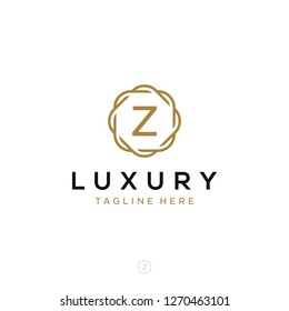 Luxurious minimalist elegant sophisticated Initial Z letters geometric rounded hexagonal badge logo design vector with line art style in gold colors for hotel, boutique, jewelry, restaurant or company